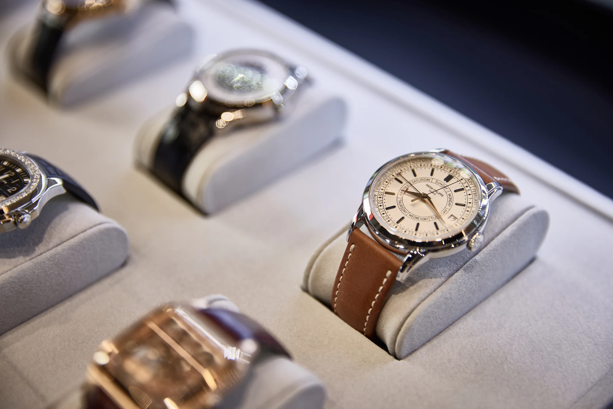Pre-owned luxury watches displayed in the showroom