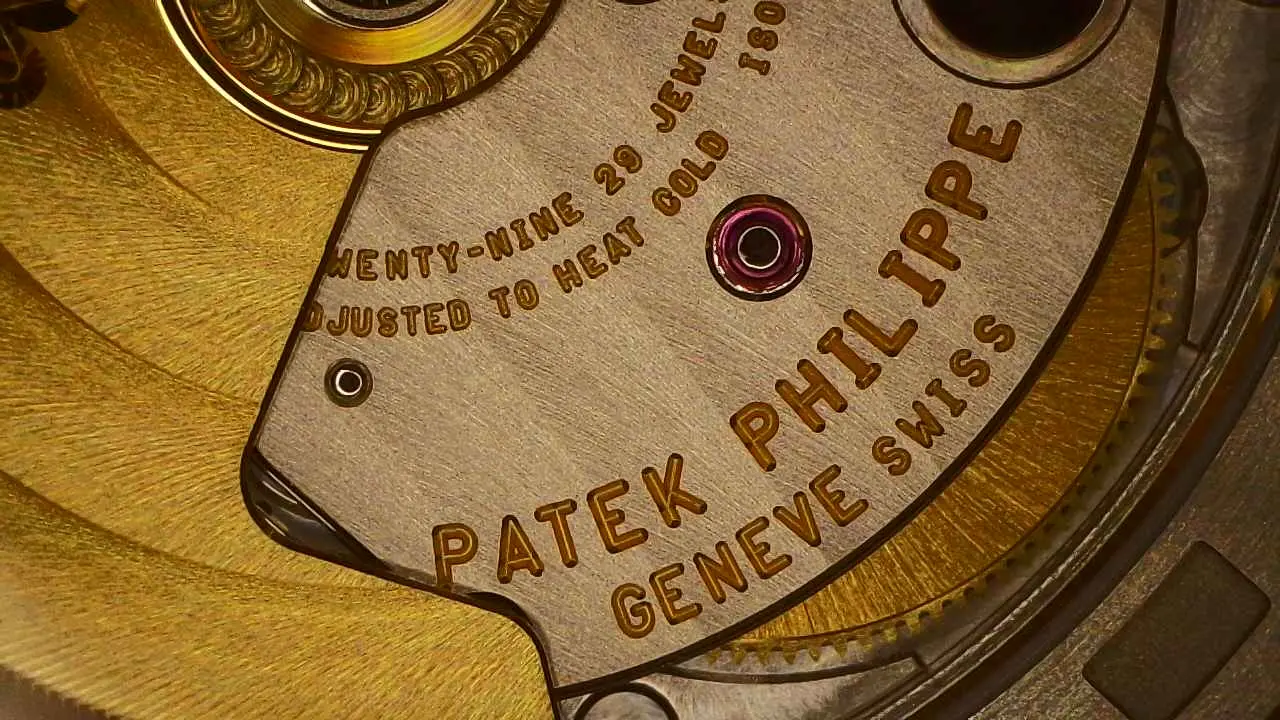 Macro view of a Patek Philippe movement engraving under inspection