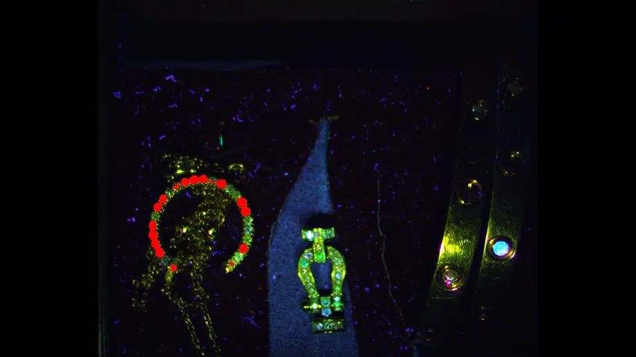 Fluorescence response captured during diamond and gemstone screening