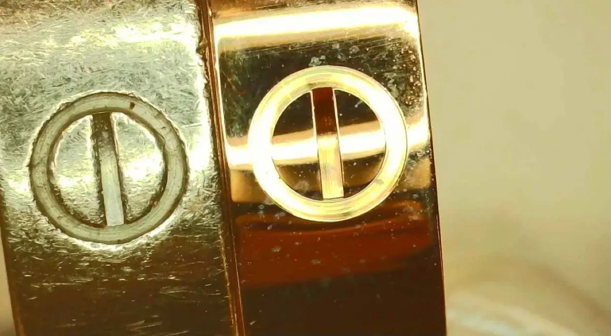Close-up of Cartier Love screw detail and workshop mark