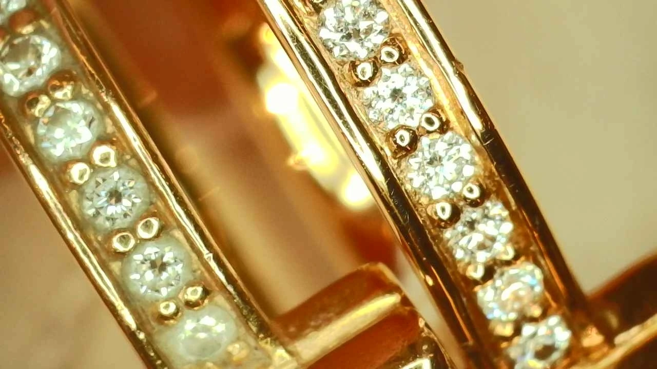 Side-by-side comparison of a fake and genuine Tiffany T1 pavé diamond ring, showing a difference in diamond size and clarity
