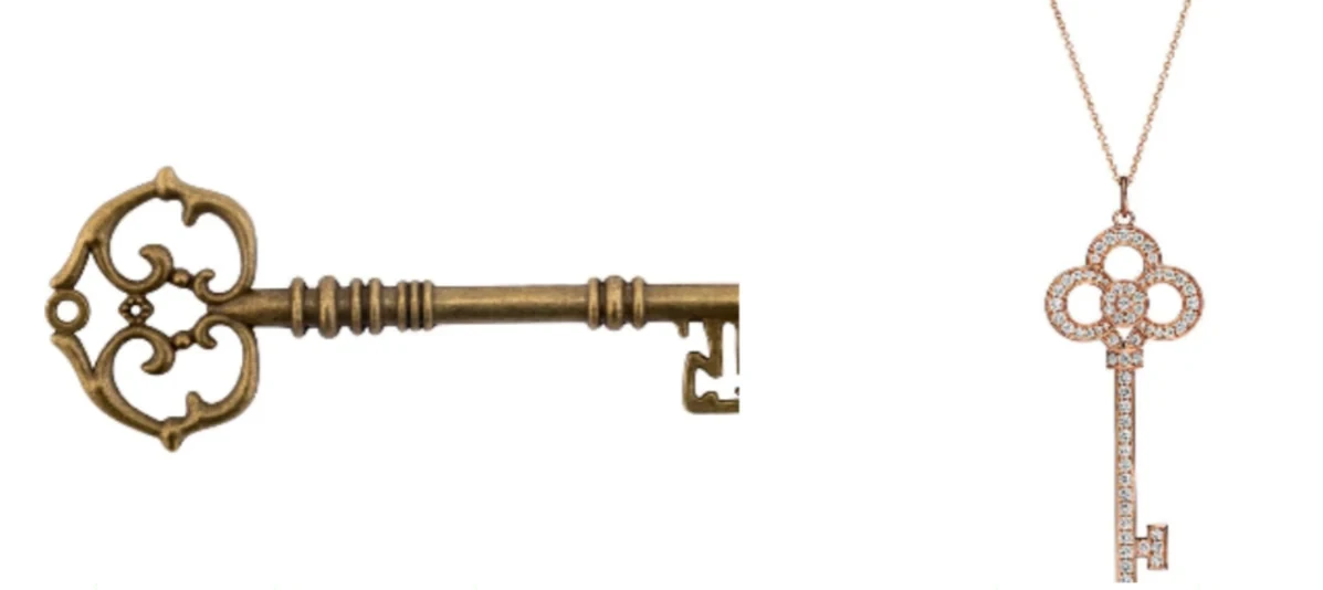 An ornate antique-style key beside a Tiffany Keys pendant in rose gold with diamonds