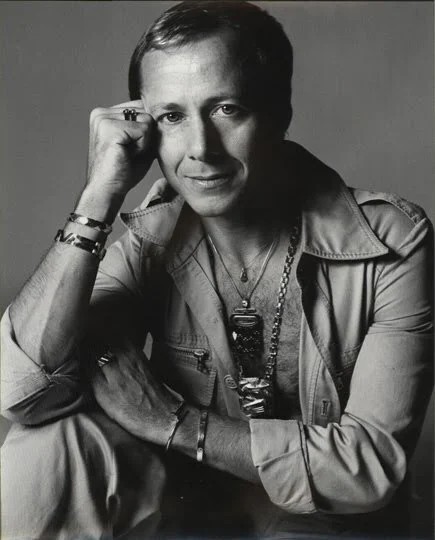 Black-and-white portrait of jewelry designer Aldo Cipullo