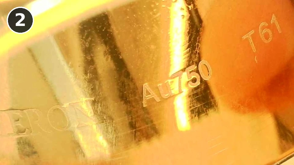 Counterfeit Boucheron Quatre ring, engraving 2: Au750 followed by T61