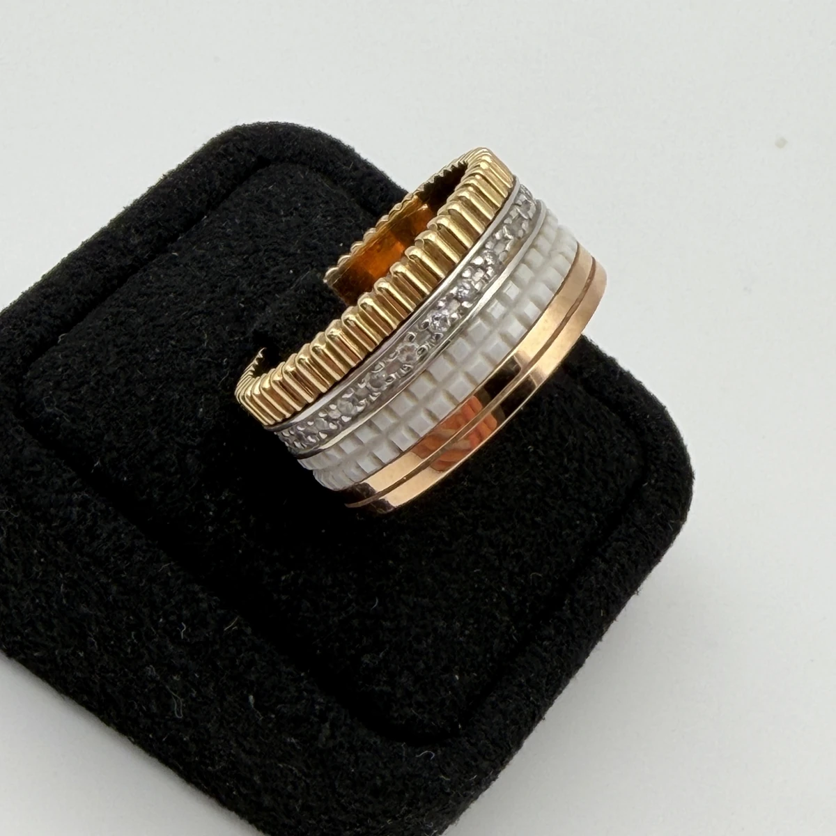 Boucheron Quatre Classic Diamond ring, large model, resting on a black velvet ring box, seen from above