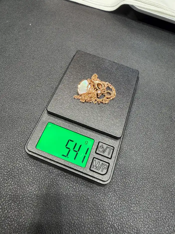 The necklace weighed on a small digital jewelry scale
