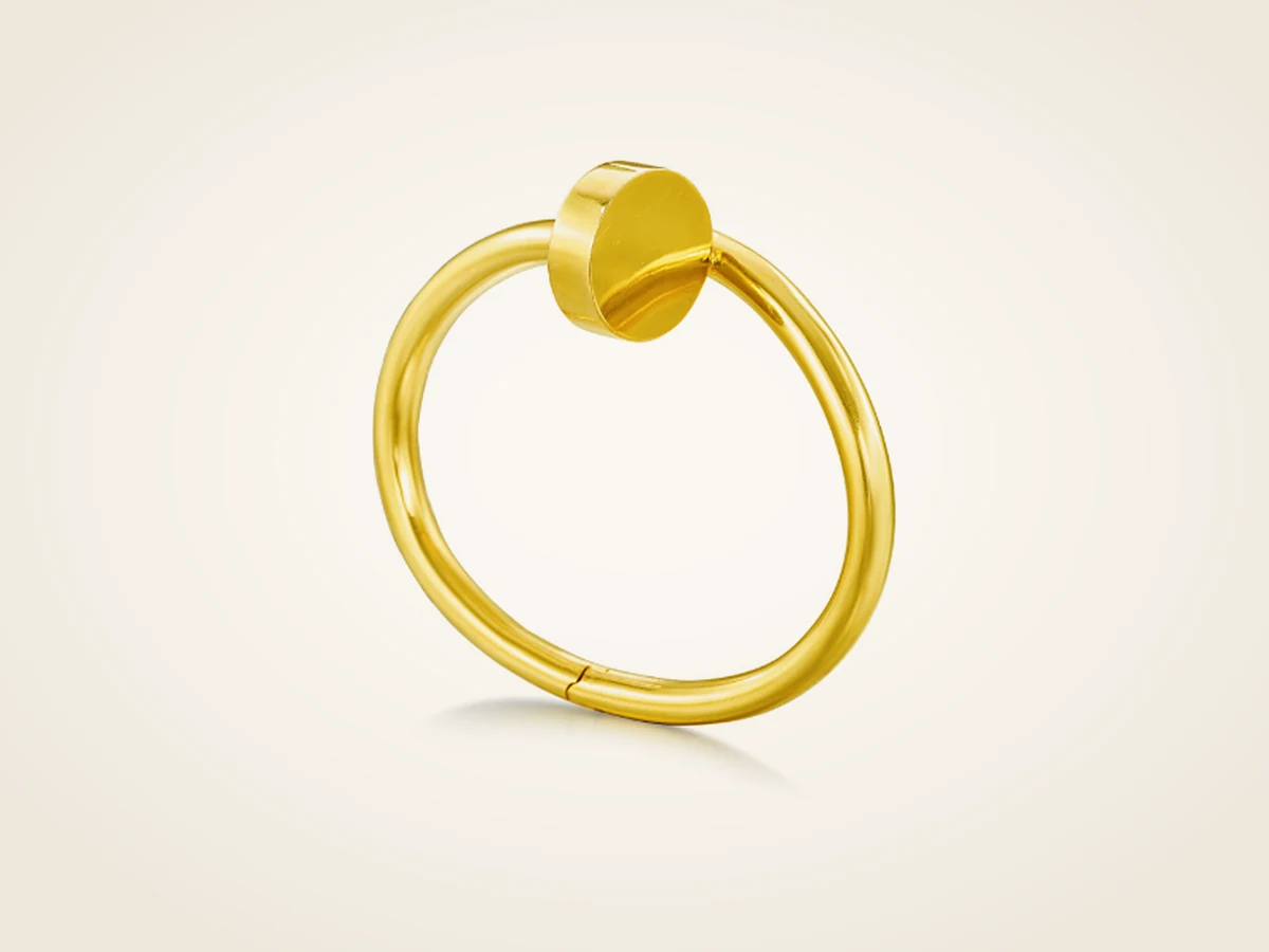 Cartier Juste un Clou bracelet in yellow gold, seen from the front with the nail head facing forward
