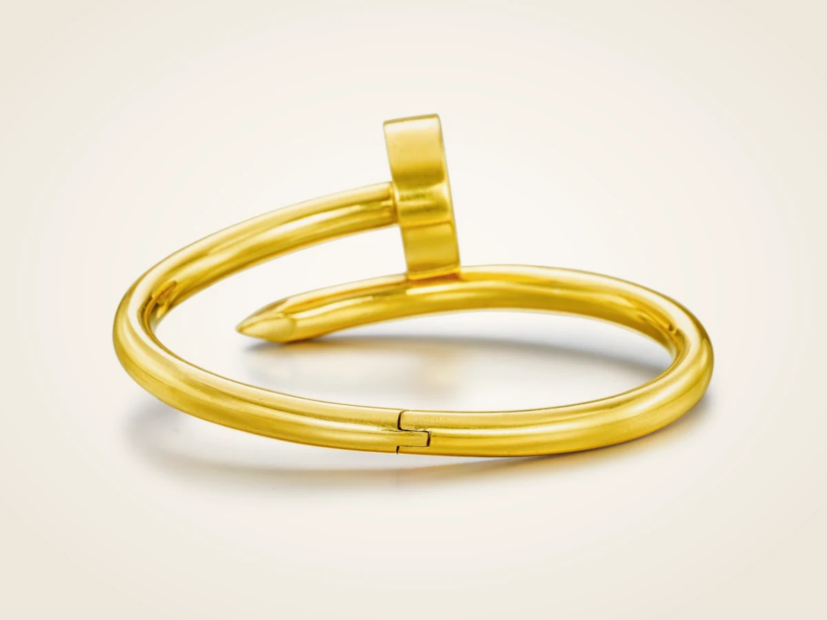 Cartier Juste un Clou bracelet in yellow gold, showing the hinge on the underside of the band
